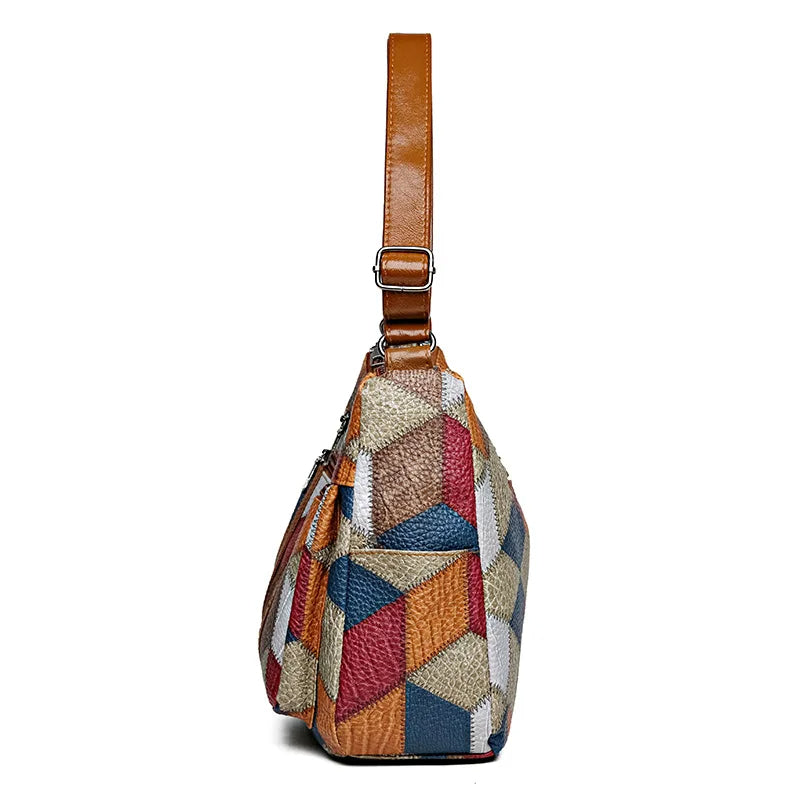 Nella patchwork shoulder bag worn crossbody