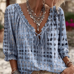 Women's relaxed misty blue polka dot blouse with a lace-up V-neck and three-quarter puff sleeves