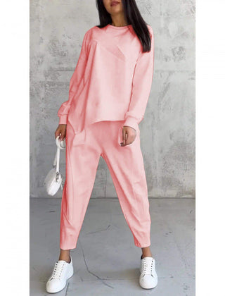 Women's relaxed irregular hem sweatshirt and pants set in pink