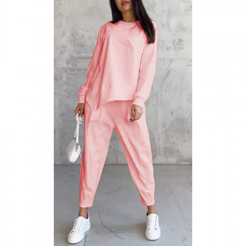 Women's relaxed irregular hem sweatshirt and pants set in pink
