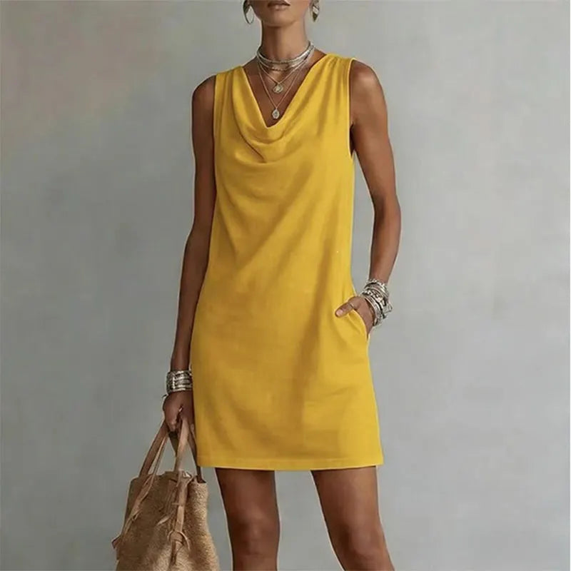 Women's yellow sleeveless pocket mini dress with a draped neckline.