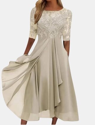 Women's cream elegant lace dress with a layered skirt