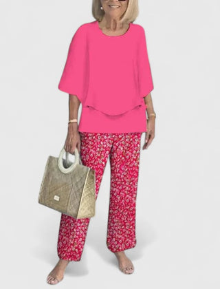 Women's loose two-piece set in hot pink with floral pants