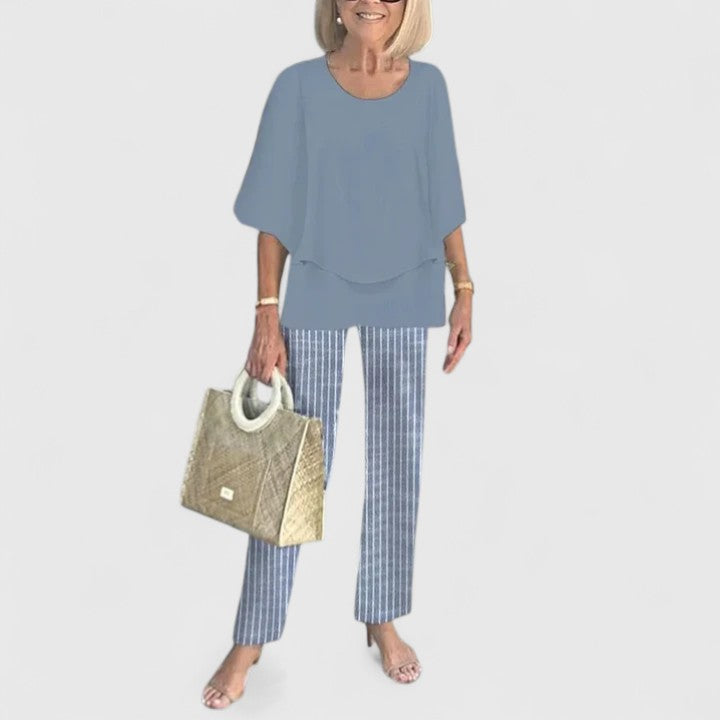 Women's loose two-piece set in slate blue with striped pants