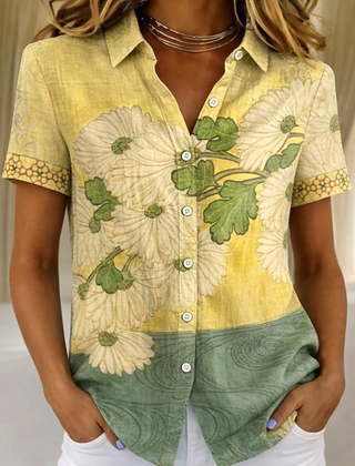 Women's relaxed yellow floral short-sleeve button-up shirt.