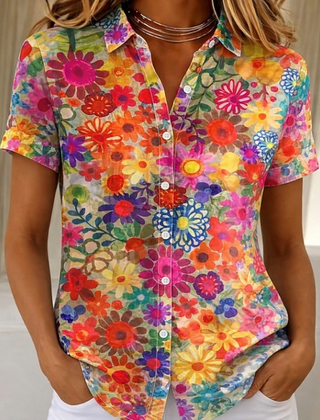 Women's relaxed orange floral short-sleeve button-up shirt.