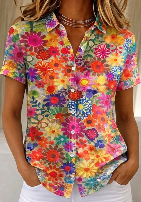 Women's relaxed orange floral short-sleeve button-up shirt.
