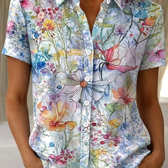 Women's relaxed light blue floral short-sleeve button-up shirt.