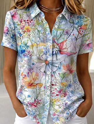 Women's relaxed light blue floral short-sleeve button-up shirt.