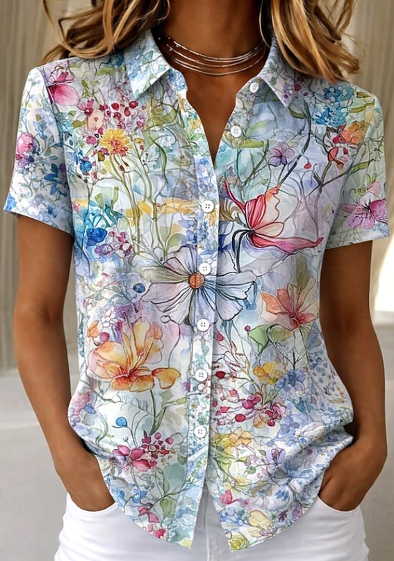 Women's relaxed light blue floral short-sleeve button-up shirt.