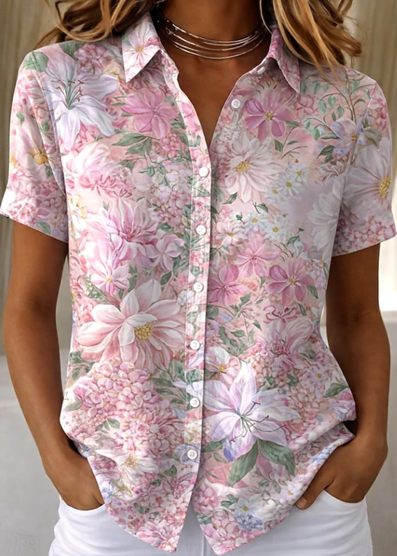 Women's relaxed pink floral short-sleeve button-up shirt.