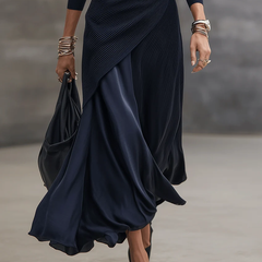 Navy maxi dress detail of V-neckline and long sleeves