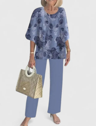 Women's two-piece set with indigo floral top and matching blue pants