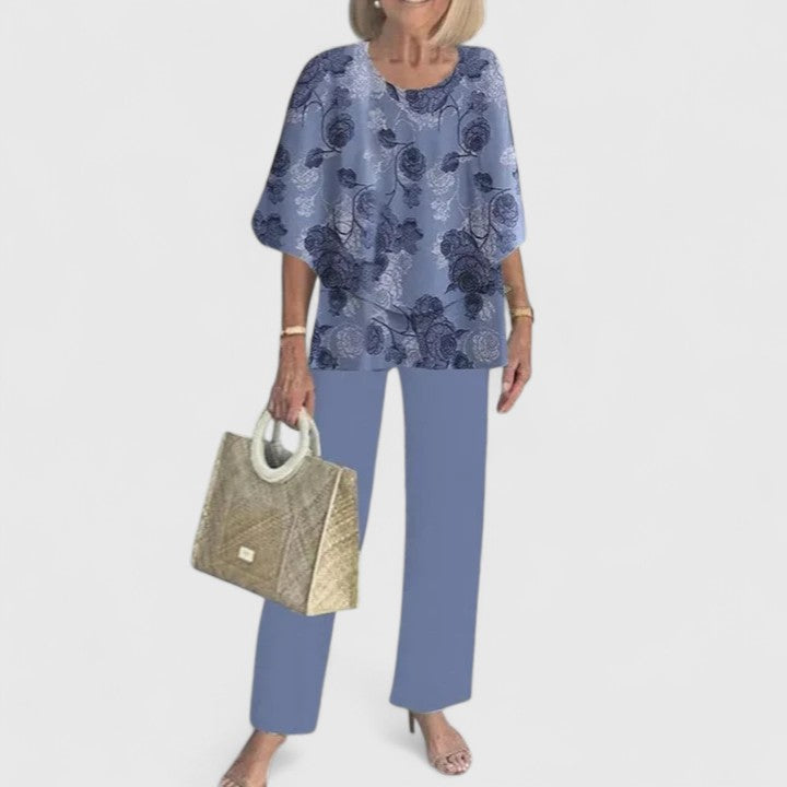 Women's two-piece set with indigo floral top and matching blue pants
