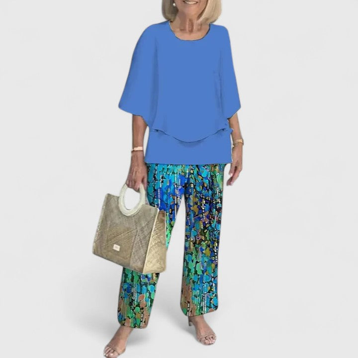 Women's loose two-piece set in cobalt blue with teal print pants