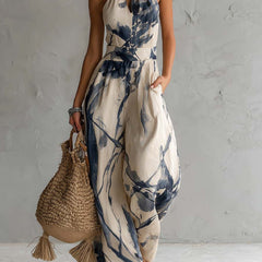 Women's wide-leg halter neck jumpsuit with printed pattern in beige