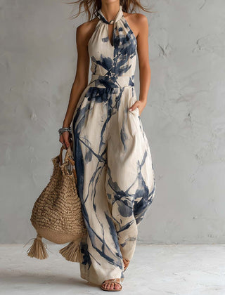Women's wide-leg halter neck jumpsuit with printed pattern in beige