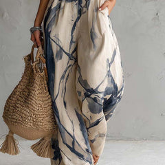Women's wide-leg halter neck jumpsuit with printed pattern, fifth view