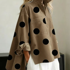 Women's khaki polka dot button-up shirt with spread collar and chest pockets.