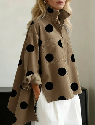 Women's khaki polka dot button-up shirt with spread collar and chest pockets.