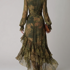 Flowing green floral maxi dress with a wrap bodice and ruffle hem.