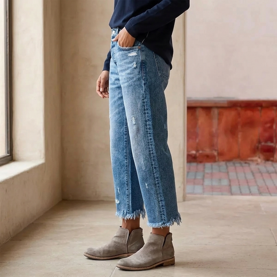 Women's cropped straight leg jeans with a fringed raw hem, second view.