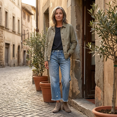 Cropped ankle-length jeans styled with footwear.
