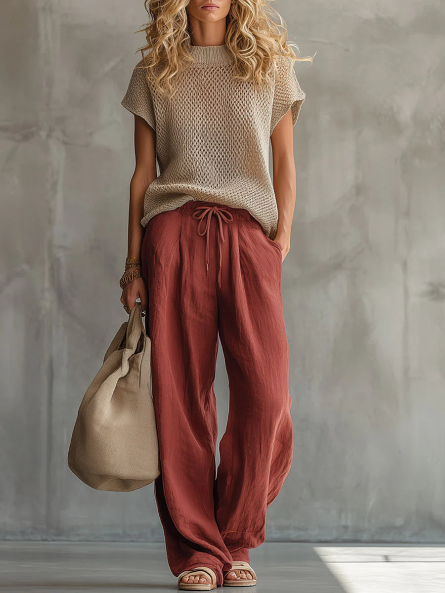 Women's red knit pullover top and linen-cotton trousers two-piece set, front view