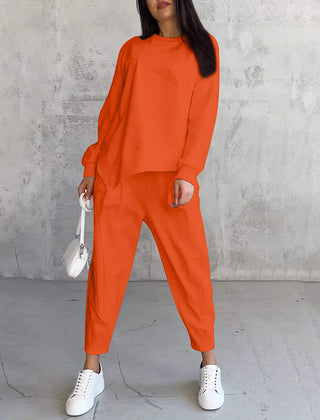 Women's relaxed irregular hem sweatshirt and pants set in orange