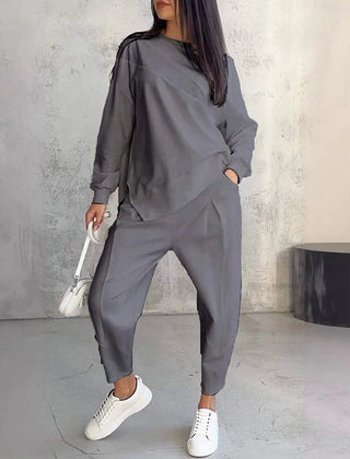 Women's relaxed irregular hem sweatshirt and pants set in grey