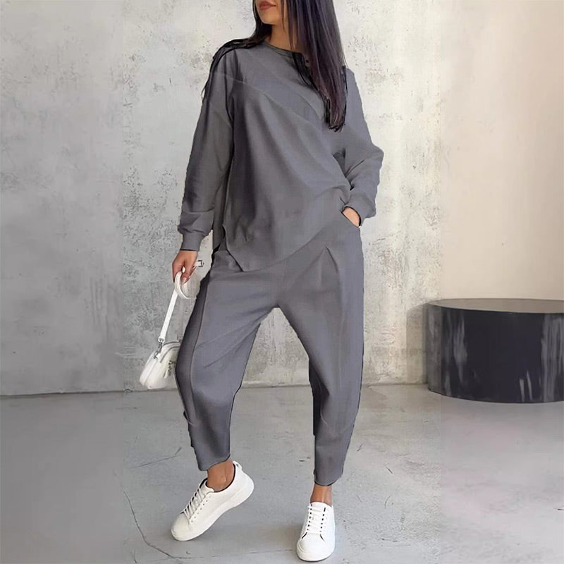 Women's relaxed irregular hem sweatshirt and pants set in grey